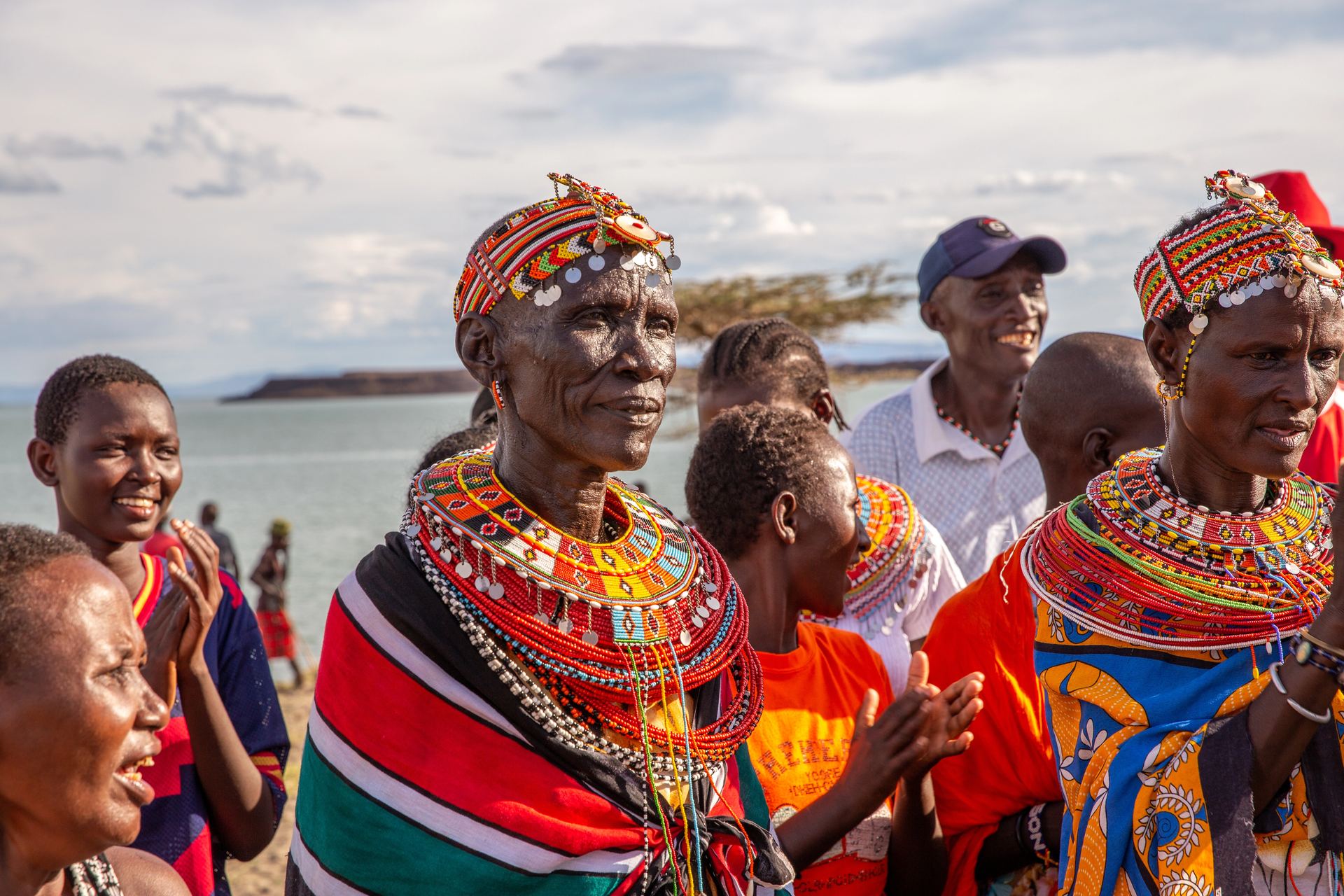 Group portrait showcasing traditional beadwork and dress.