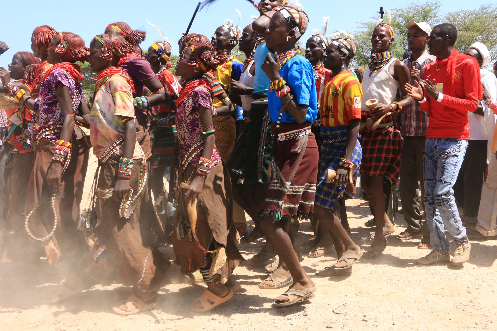 Dancers in red and white at Kalacha Cultural Festival